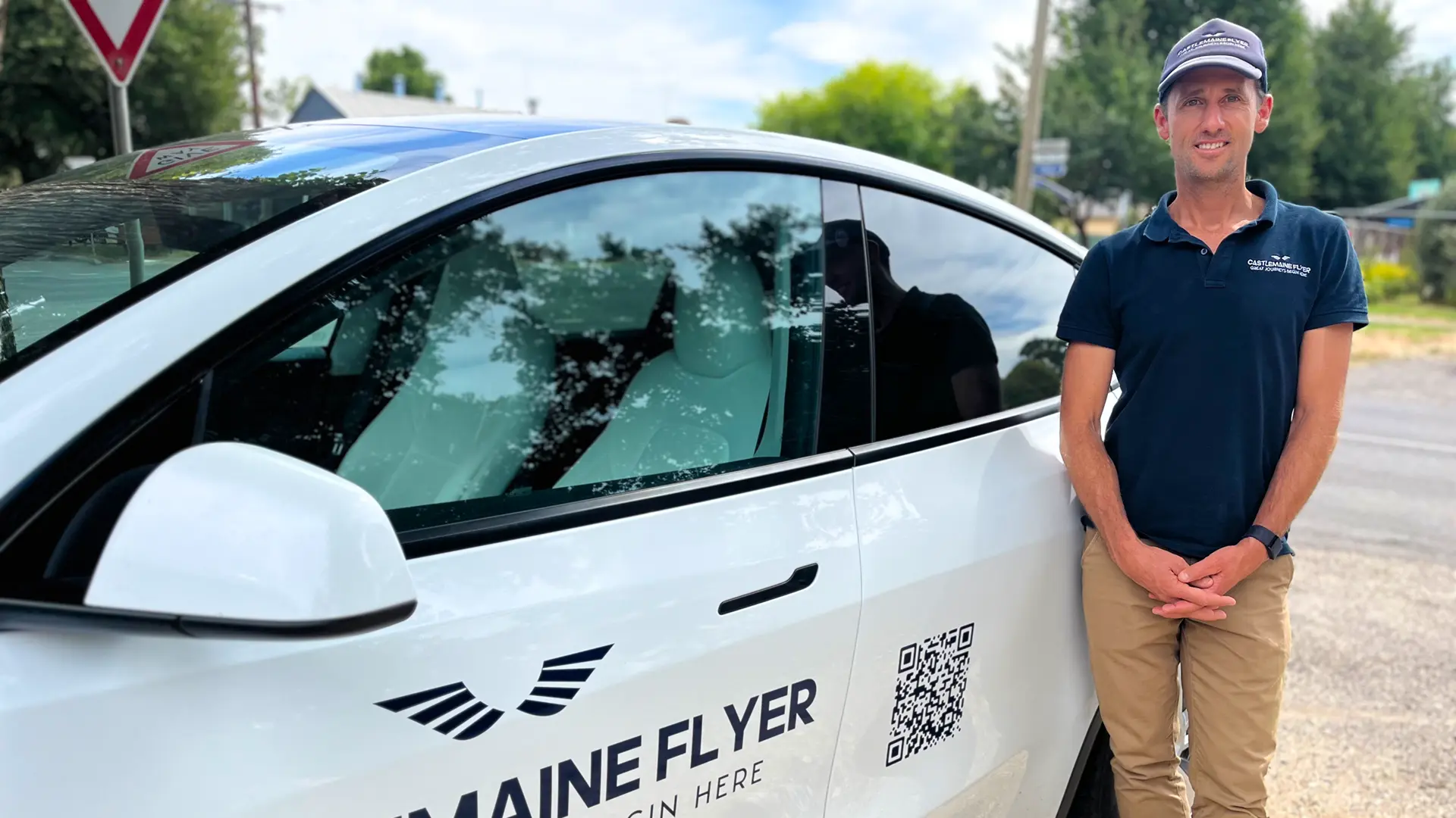 Nick with one of the Tesla fleet.