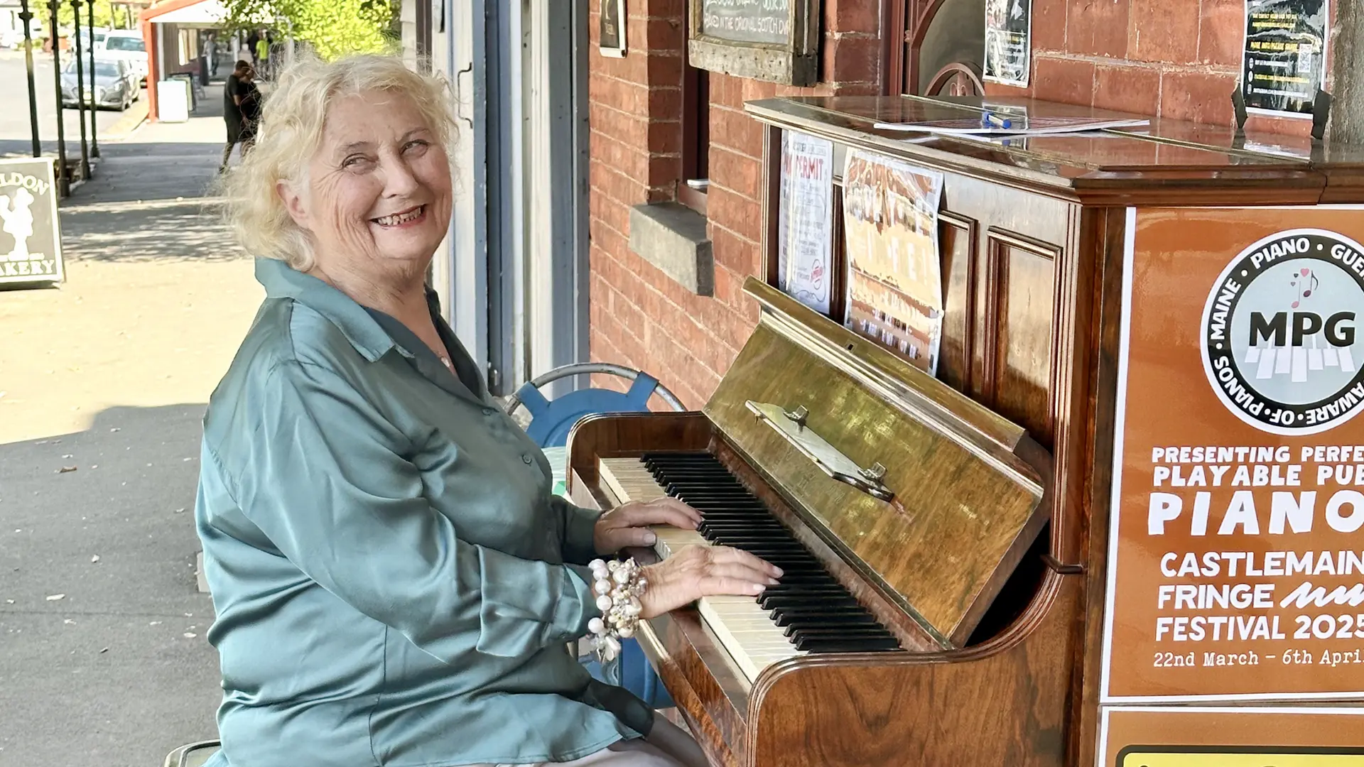 Maggie Jackson jazzes up Maldon at the temporary piano. Photo courtesy Maine Piano Guerrillas.
