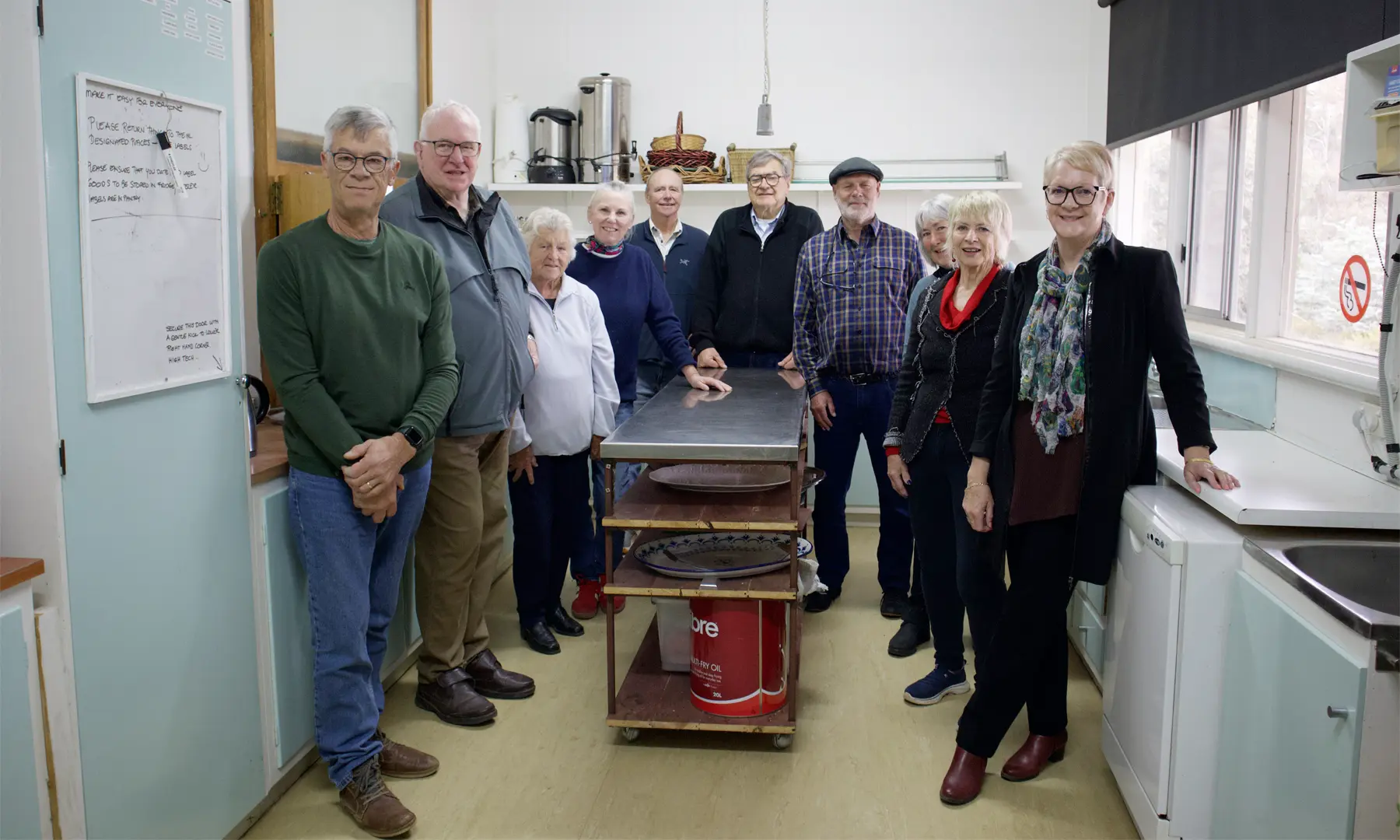 Left: In the soon-to-be-upgraded Golf Club Kitchen: Glyn Milner, Bob Briggs, Maureen McQuillan, Amanda Fedorowicz, Bruce Ackland, Andrew Fedorowicz, John Crofts, Sally Dear, Kerryn Healy, Maree Edwards MP. Right: Celebrating the grant to improve the walking paths at Tarrangower Village.