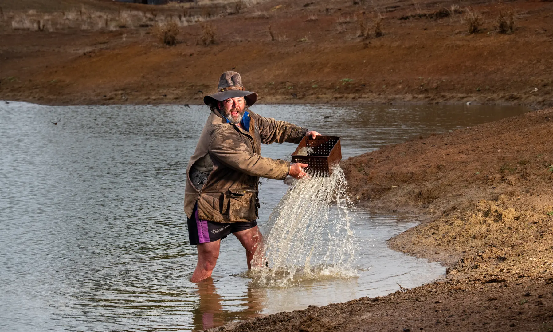 Revisiting our April Cover Star: Farmer Adam Sewell is delighted that his dam has received some rain. Photo courtesy of Rob Leeson.